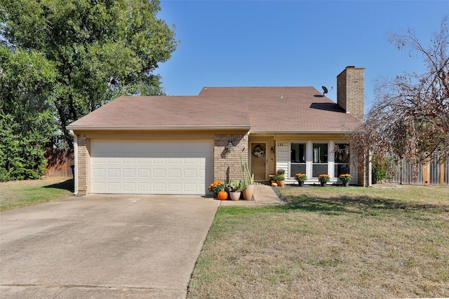 single story home with a garage, covered porch, and a front yard