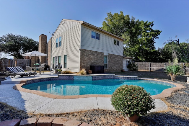 view of pool with a patio area