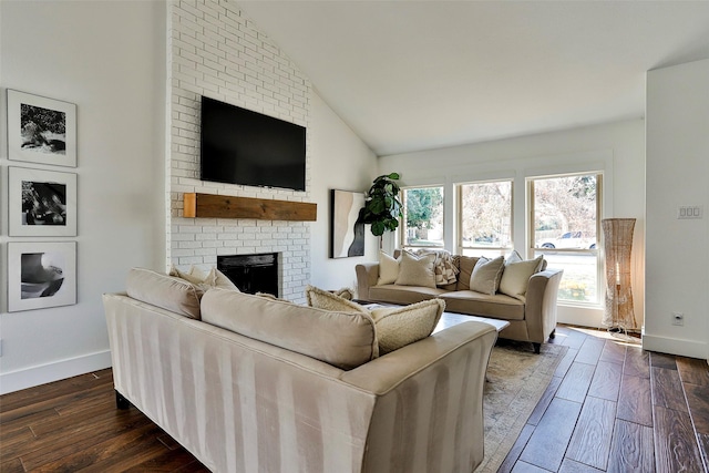 living room with a brick fireplace, high vaulted ceiling, and dark hardwood / wood-style flooring