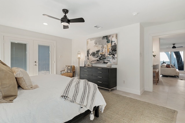 bedroom with french doors, ceiling fan, and access to outside