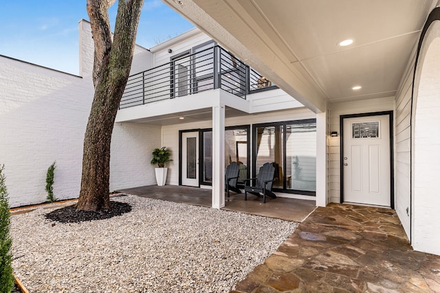 exterior space featuring a patio and a balcony