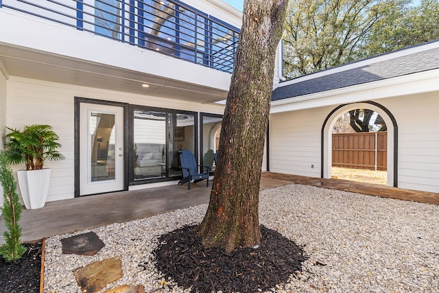 property entrance featuring a patio