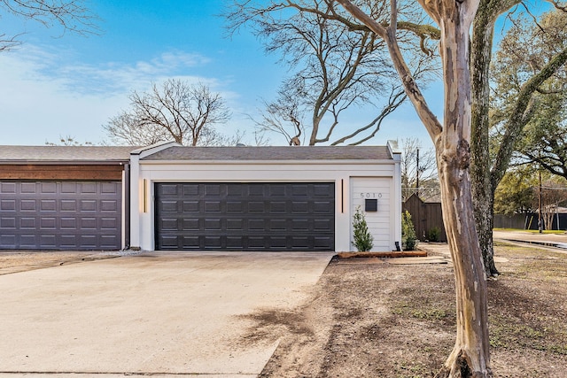 view of side of property featuring a garage