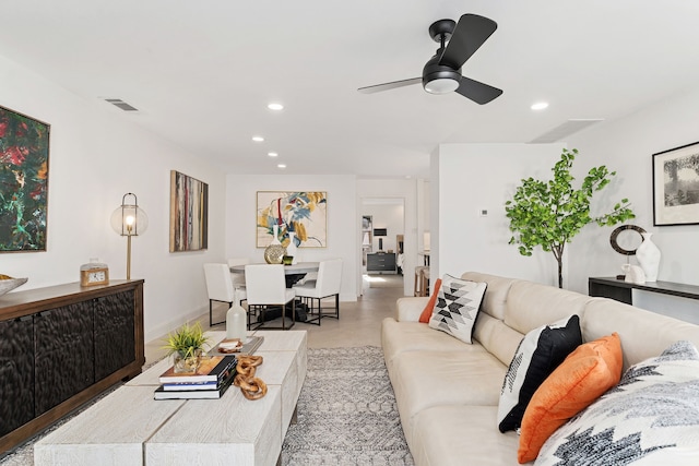 living room featuring ceiling fan