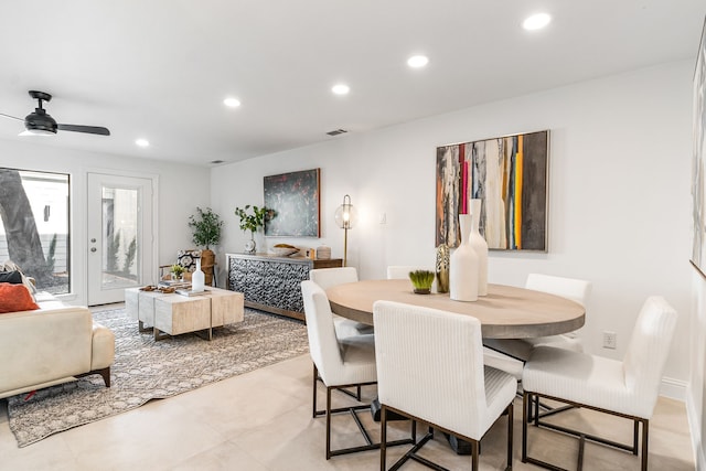 dining room featuring ceiling fan