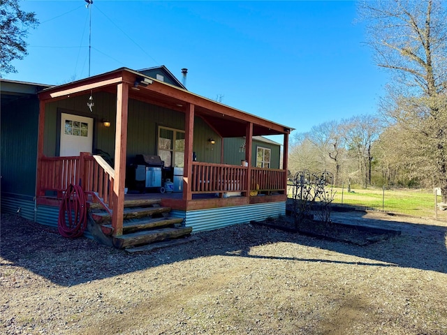 exterior space featuring covered porch