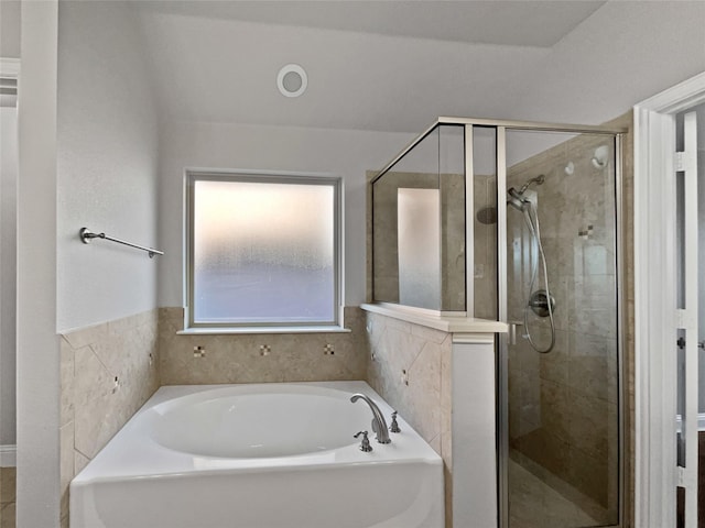 bathroom featuring plus walk in shower