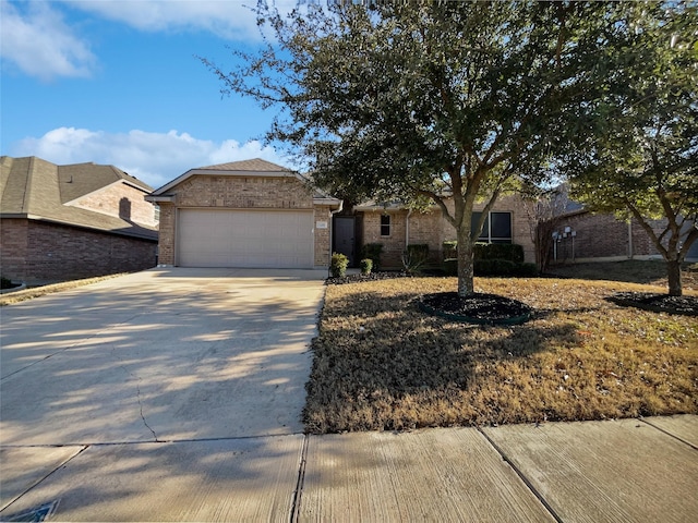 ranch-style home with a garage