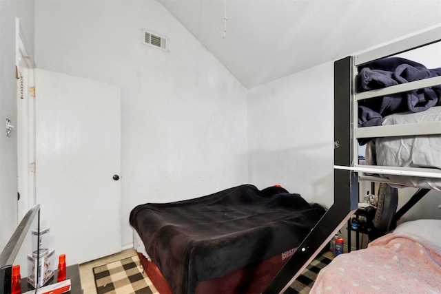 bedroom with vaulted ceiling