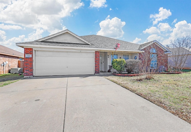 ranch-style house with a garage and a front yard