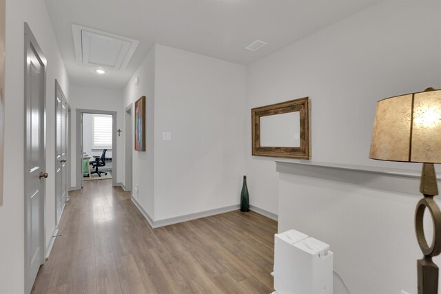 bedroom with dark hardwood / wood-style floors and connected bathroom