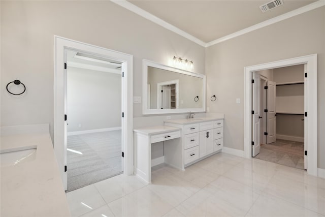 bathroom featuring vanity and ornamental molding