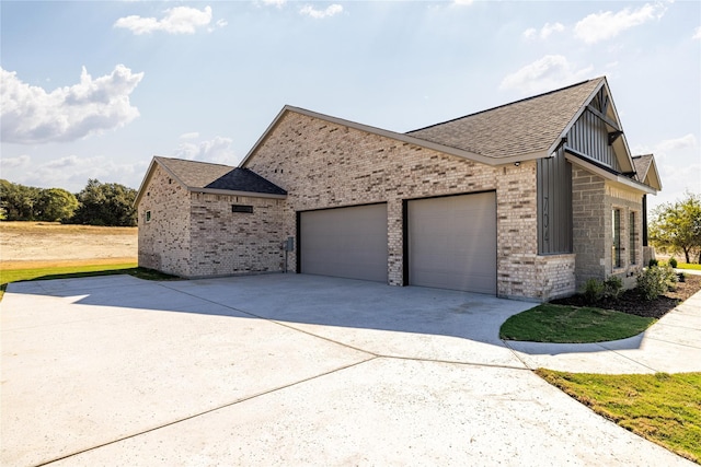 view of property exterior with a garage