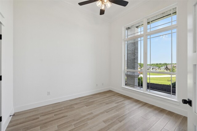 unfurnished dining area featuring ornamental molding, sink, a notable chandelier, and light hardwood / wood-style flooring