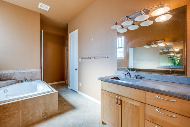2002 Moser Ave, Dallas, TX 75206 - bathroom featuring tile patterned floors, vanity, and tiled tub