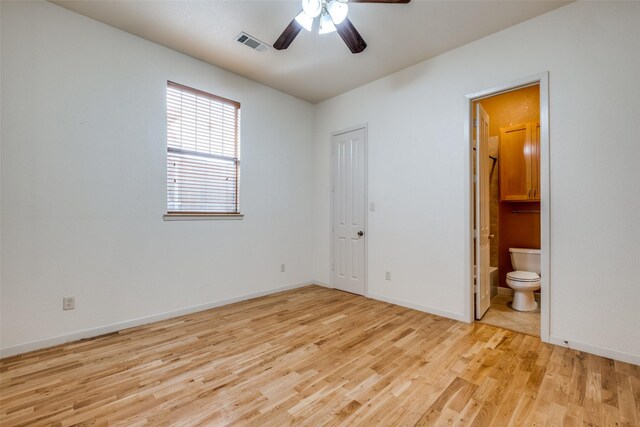 2002 Moser Ave, Dallas, TX 75206 - unfurnished bedroom with ensuite bath, light hardwood / wood-style floors, and ceiling fan