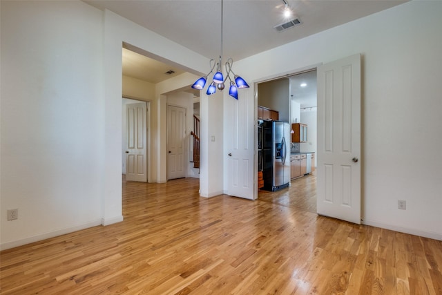 2002 Moser Ave, Dallas, TX 75206 - unfurnished dining area with light hardwood / wood-style floors