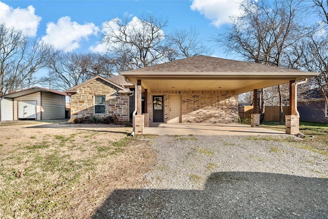 view of front facade with a carport