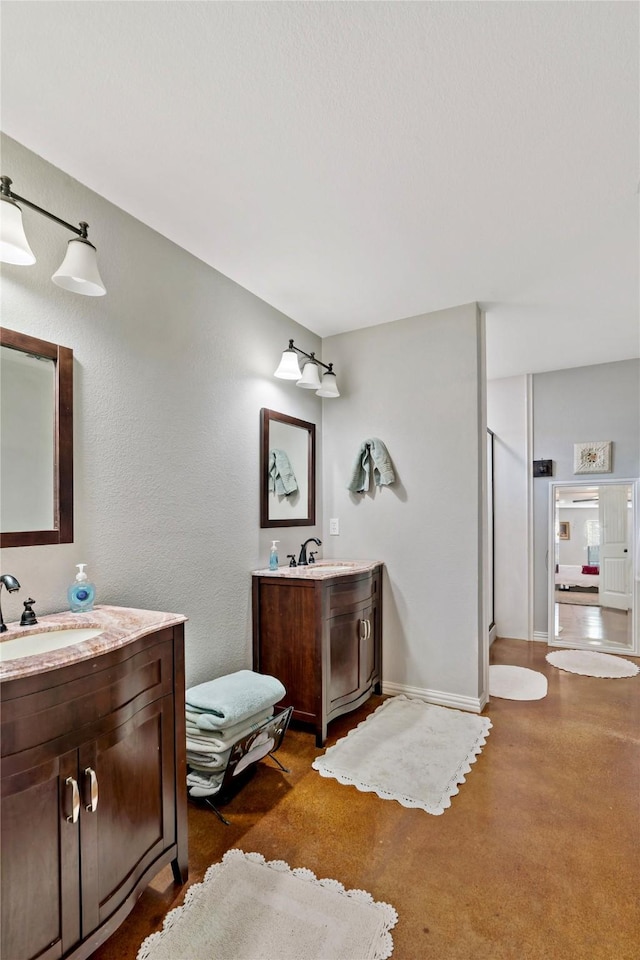 bathroom with vanity and an enclosed shower