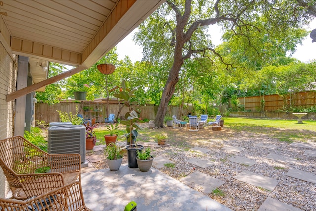 view of patio with central AC