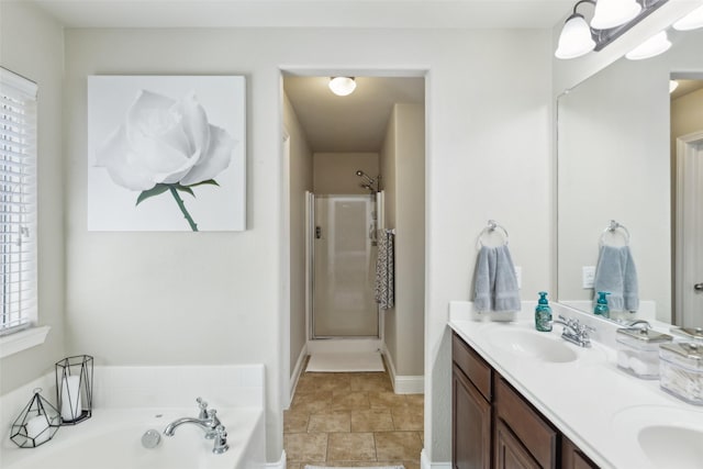 bathroom featuring vanity and a bathtub