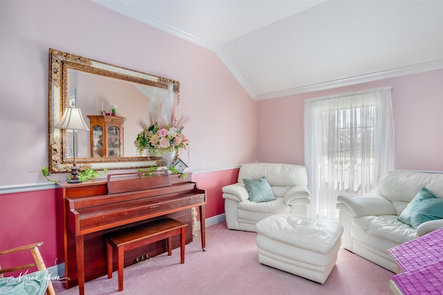 sitting room featuring vaulted ceiling, carpet flooring, and crown molding