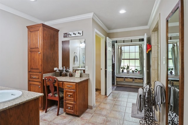 bathroom with vanity and crown molding