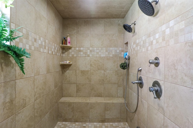 bathroom featuring tiled shower