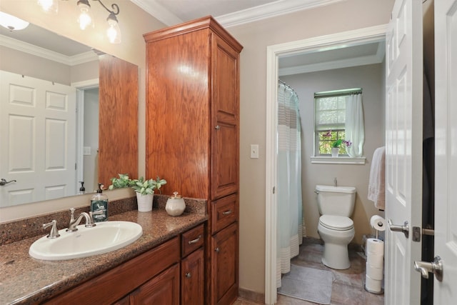 bathroom featuring crown molding, vanity, and toilet