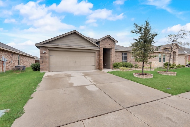 ranch-style home featuring a garage and a front lawn