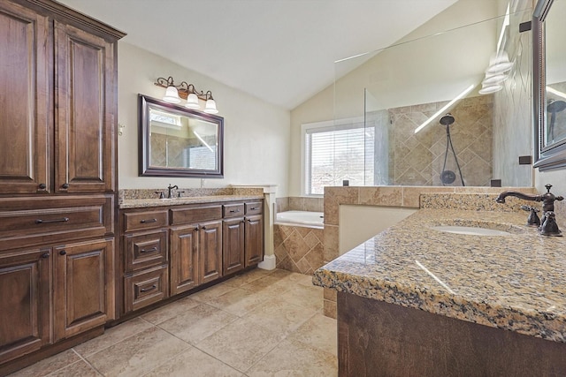 bathroom featuring plus walk in shower, lofted ceiling, vanity, and tile patterned floors