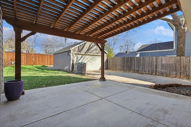 view of patio / terrace with a pergola, a garage, and an outdoor structure