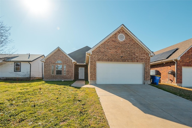 front facade with a garage and a front lawn