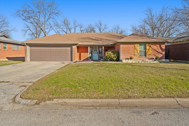 single story home with a garage and a front lawn