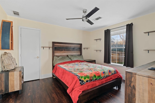 bedroom with dark wood-type flooring and ceiling fan