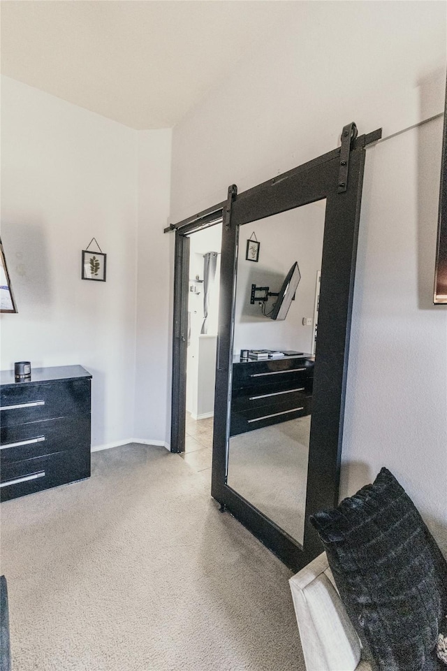 interior space featuring a barn door