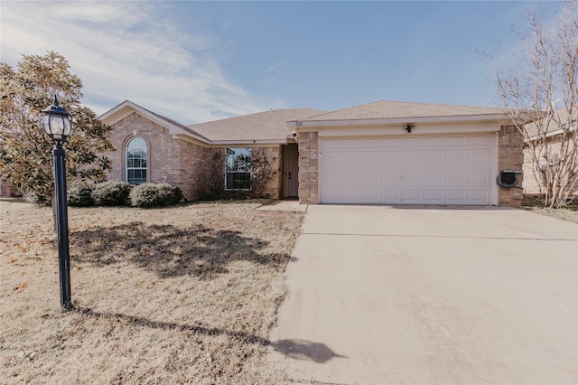 ranch-style house featuring a garage