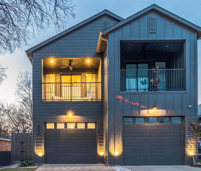 view of front of house featuring a balcony and a garage