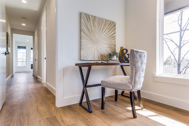 home office featuring light hardwood / wood-style floors