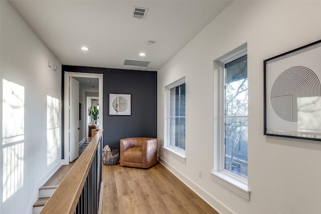 hallway featuring light hardwood / wood-style flooring