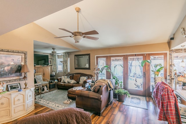 living room featuring lofted ceiling and dark hardwood / wood-style flooring