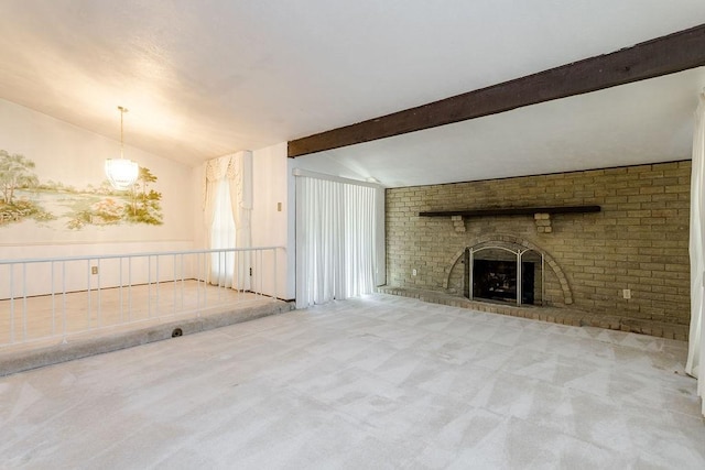 unfurnished living room featuring light carpet, a brick fireplace, and lofted ceiling with beams