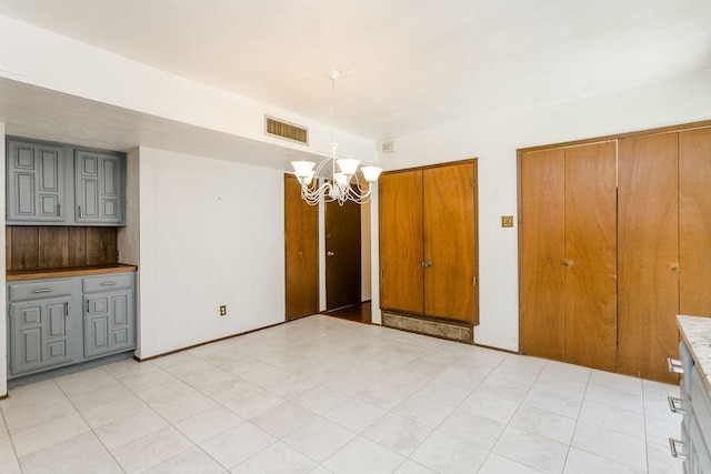 interior space featuring an inviting chandelier