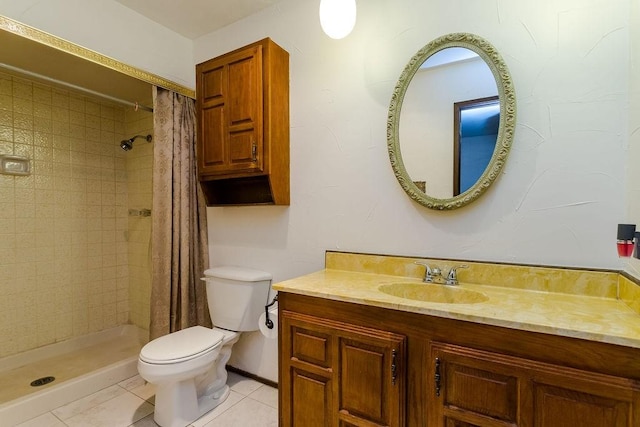 bathroom with tile patterned floors, toilet, a shower with shower curtain, and vanity