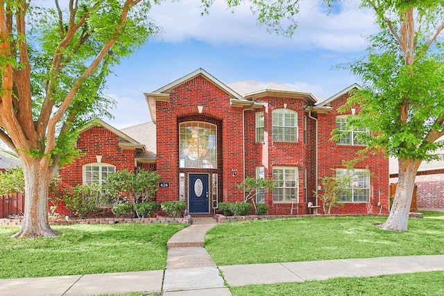 view of front of home with a front lawn