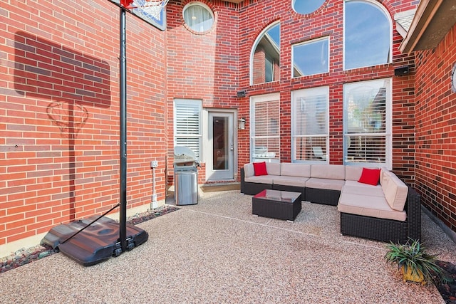 view of patio / terrace featuring area for grilling and an outdoor hangout area