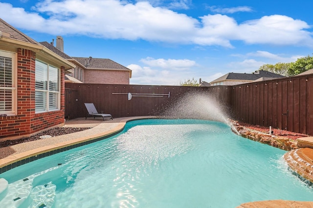 view of pool with pool water feature