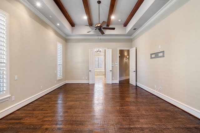 empty room with beamed ceiling, dark hardwood / wood-style floors, and ceiling fan