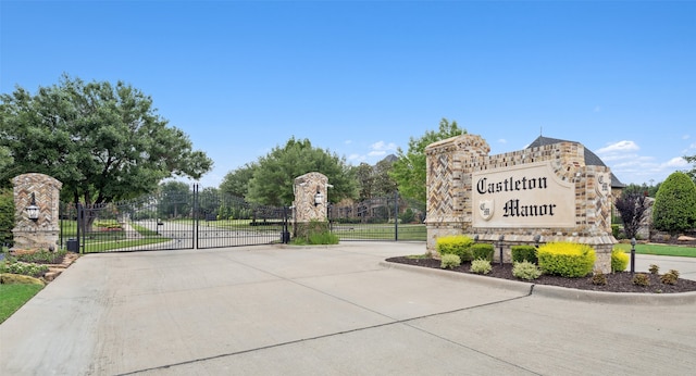 6900 Sir Spencer Ct, Colleyville, TX 76034 - community sign with a gate and concrete driveway