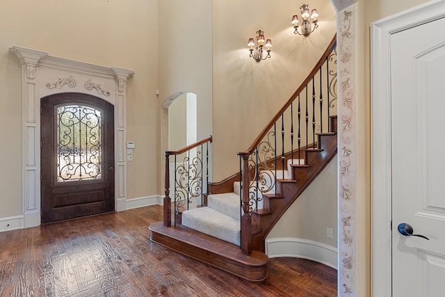 entryway with hardwood / wood-style floors